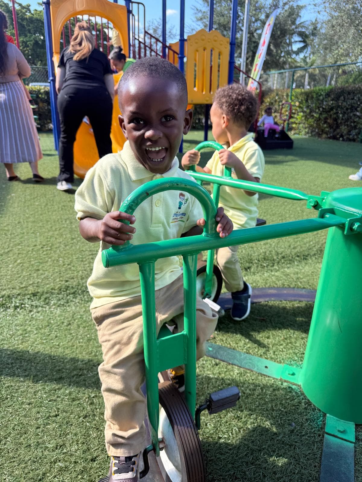 Children playing on outdoor playground equipment